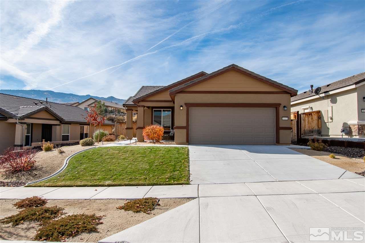1137 Callaway Trail Reno, NV 89523 - Photo 1 of 22 a front view of a house with garden
