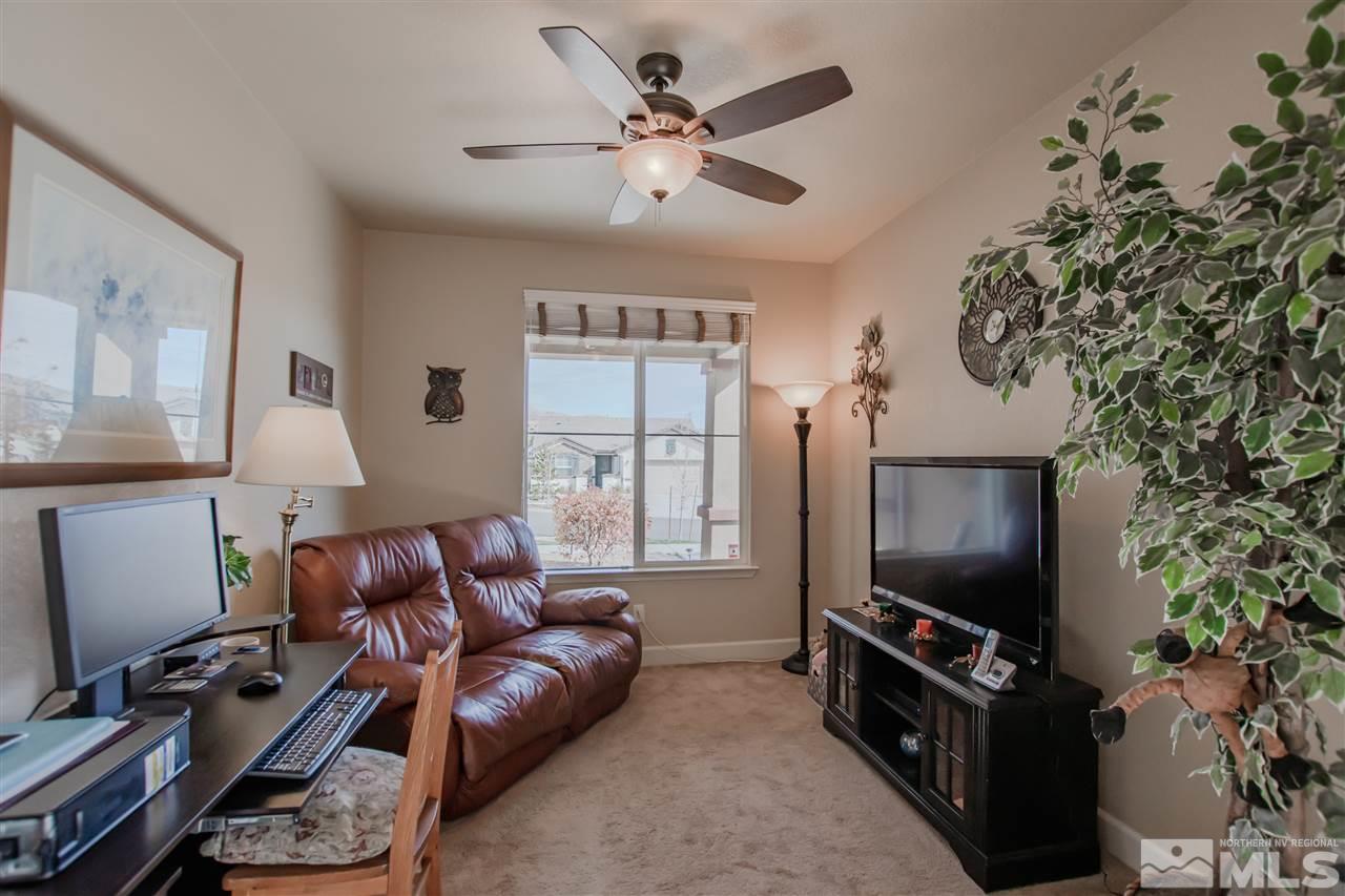 1137 Callaway Trail Reno, NV 89523 - Photo 14 of 22 a living room with furniture and a flat screen tv