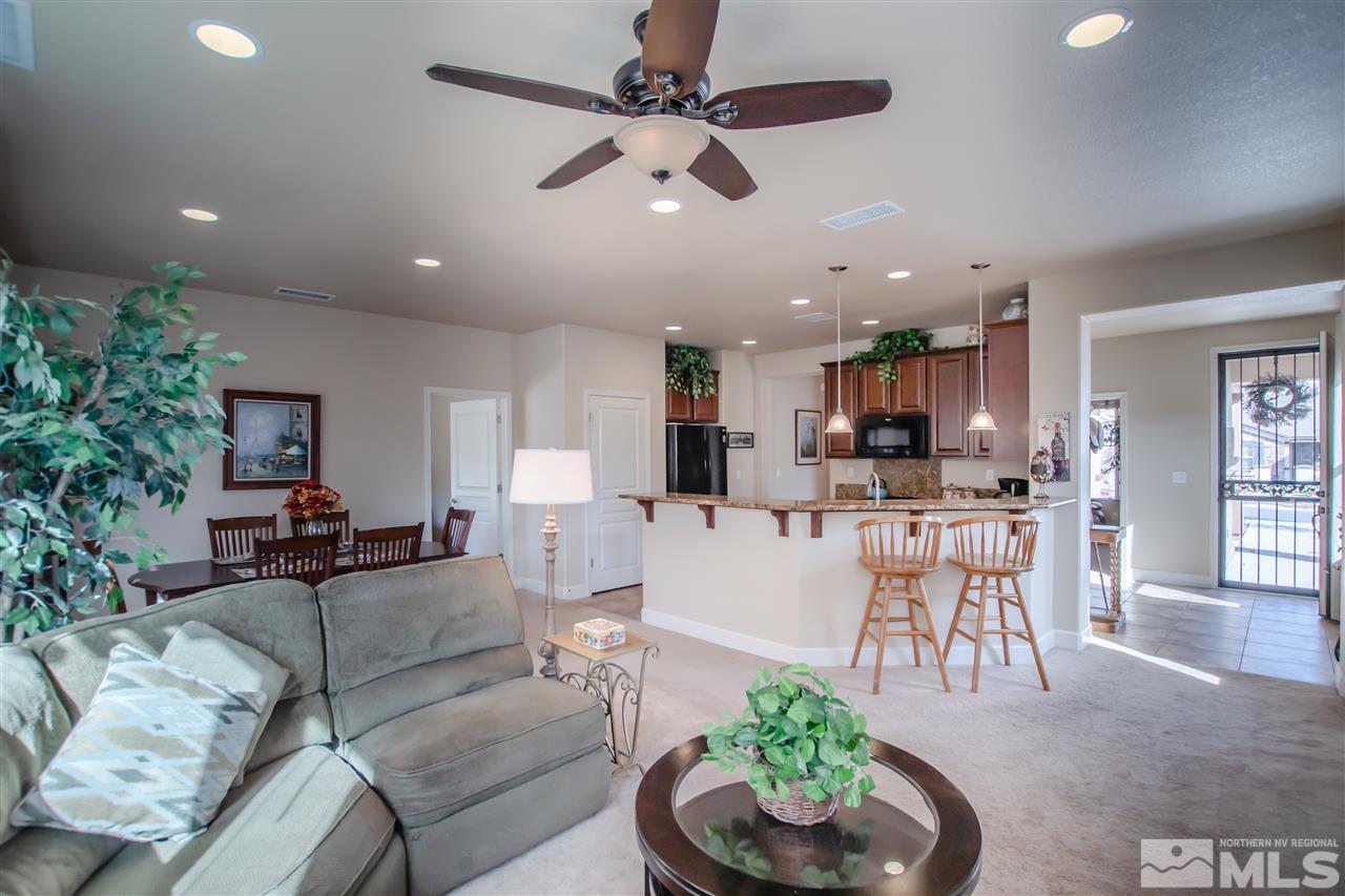 1137 Callaway Trail Reno, NV 89523 - Photo 5 of 22 a living room with furniture kitchen and a chandelier