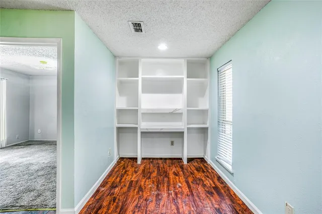 a view of a room with rack on the wall