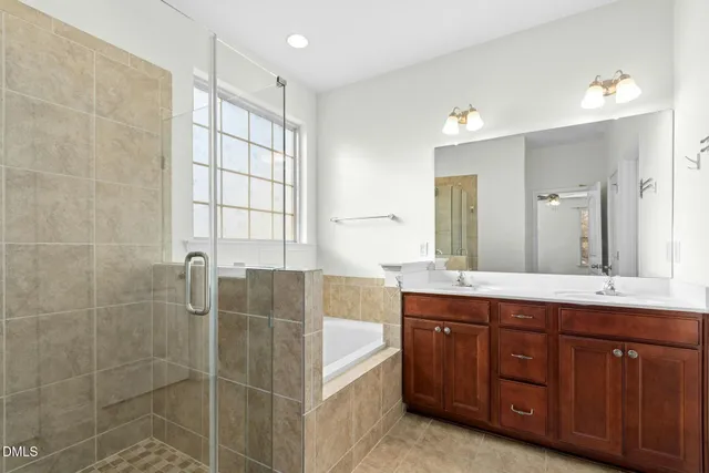 a view of a livingroom with wooden floor and a window