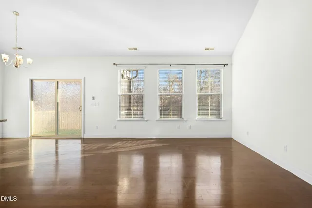 a view of a hallway with staircase