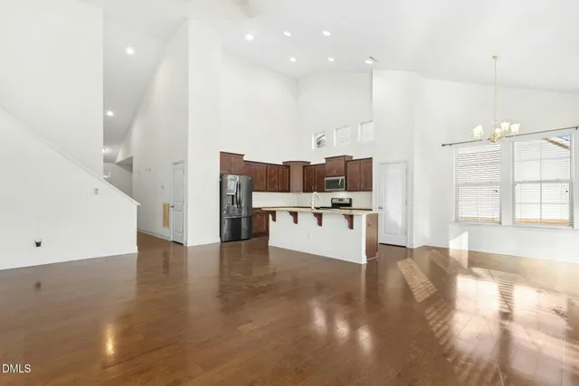 a view of a livingroom with wooden floor