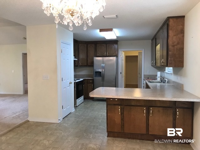 221 Scott Road Brewton, AL 36426 - Photo 5 of 18 Dining Area to Kitchen