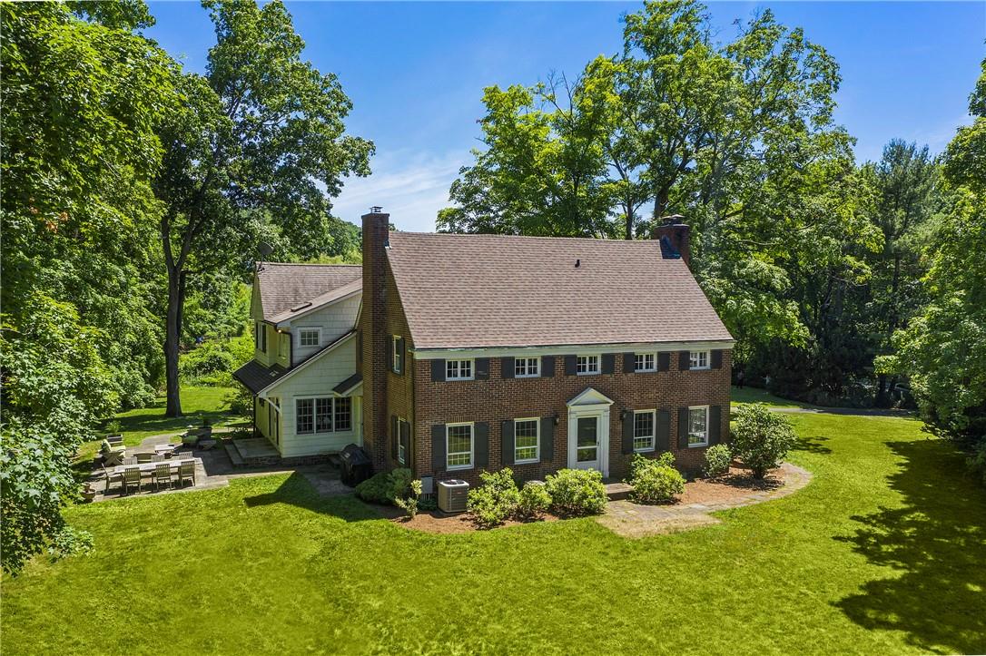 Timeless classic 1941 brick and shingle colonial in Chappaqua's sought after Lawrence Farms East