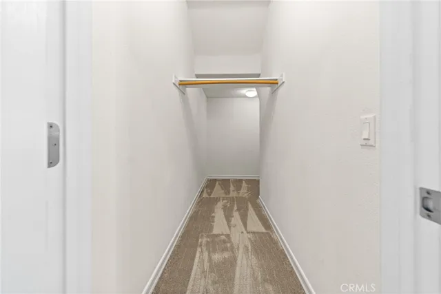 a view of hallway with livingroom