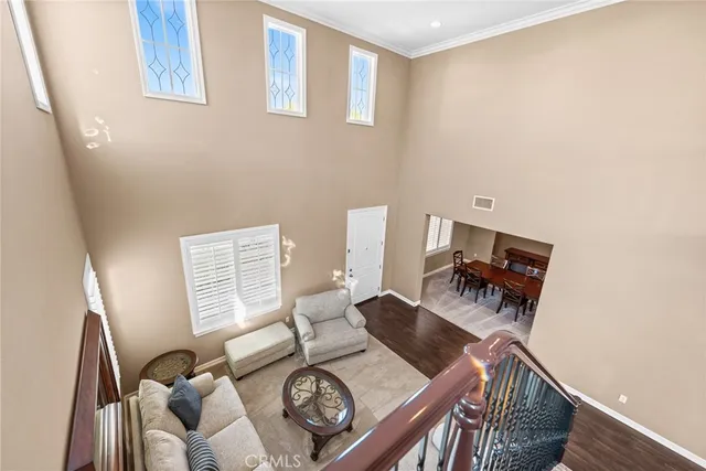 a spacious bedroom with a bed and window