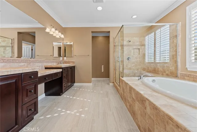 a view of a room with furniture and window