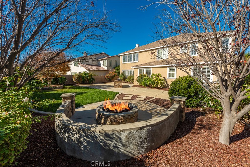 32437 Yosemite Lane Temecula, CA 92592 - Photo 7 of 63 a view of outdoor sitting area with furniture and garden