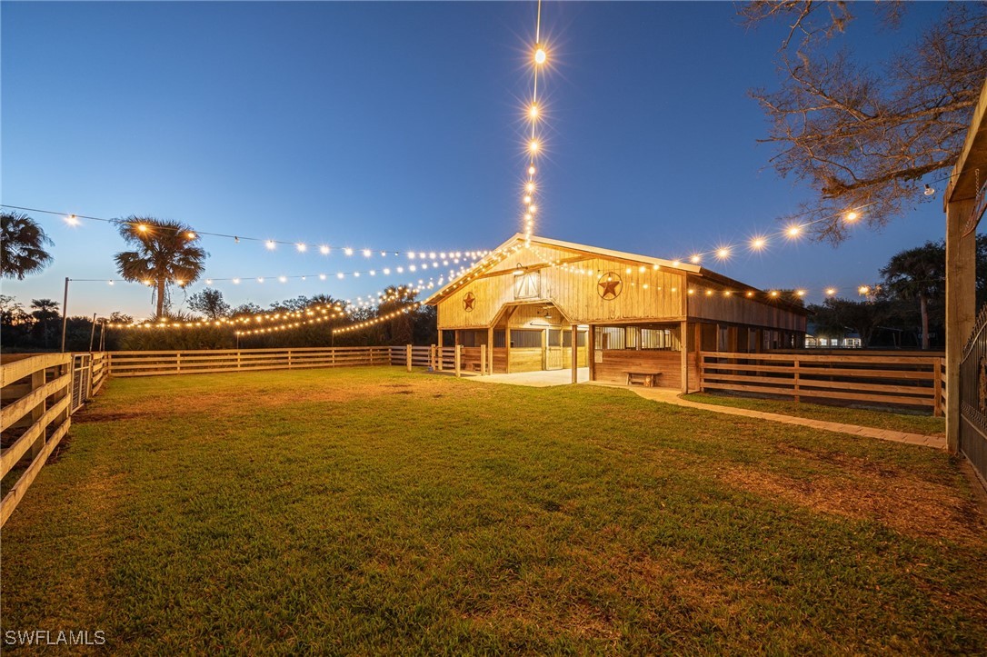 12251 Old Rodeo Drive Alva, FL 33920 - Photo 17 of 49 a view of a swimming pool and an outdoor space