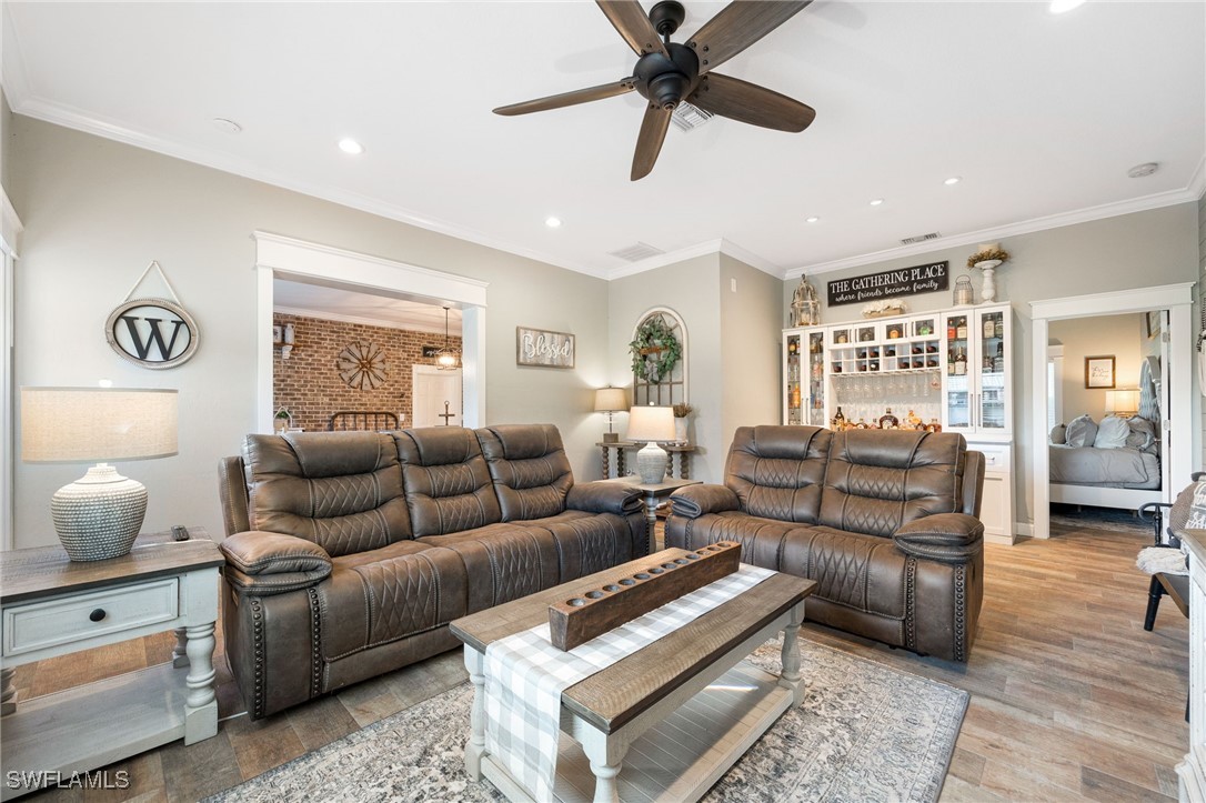 12251 Old Rodeo Drive Alva, FL 33920 - Photo 27 of 49 a living room with furniture and a window