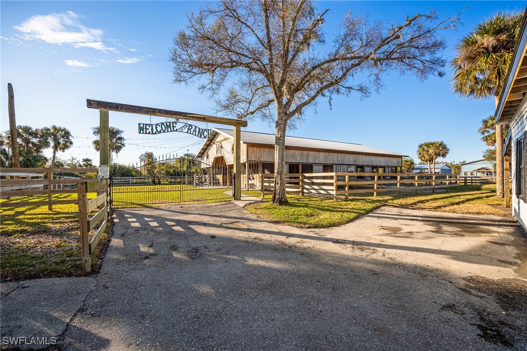 12251 Old Rodeo Drive Alva, FL 33920 - Photo 38 of 49 a view of swimming pool with outdoor seating