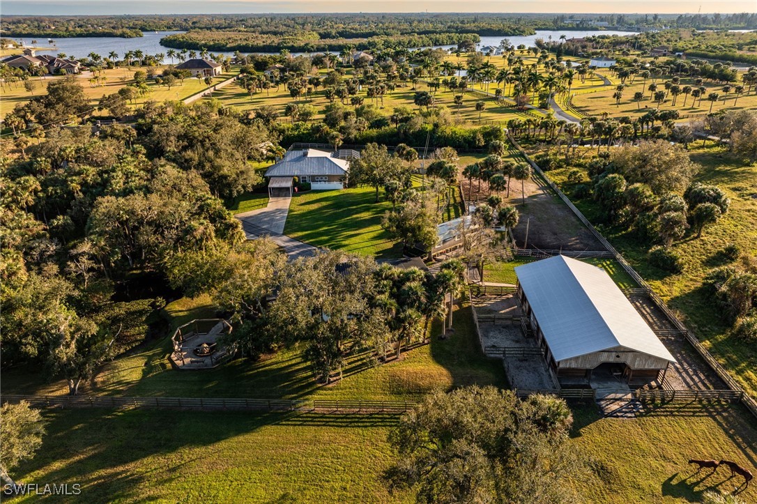 12251 Old Rodeo Drive Alva, FL 33920 - Photo 46 of 49 an aerial view of residential houses with outdoor space