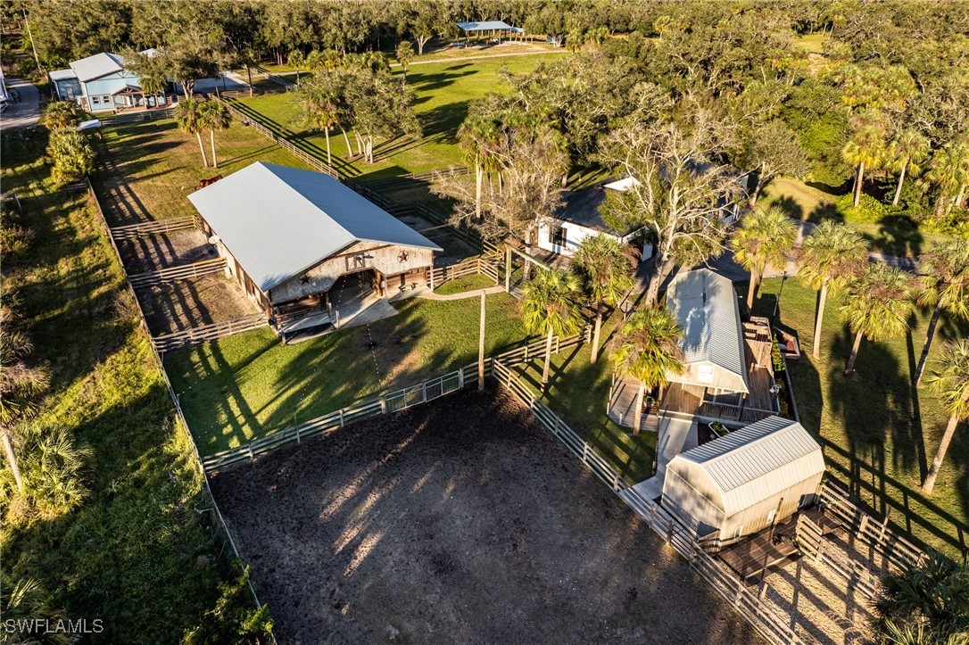 12251 Old Rodeo Drive Alva, FL 33920 - Photo 47 of 49 an aerial view of a house with a yard
