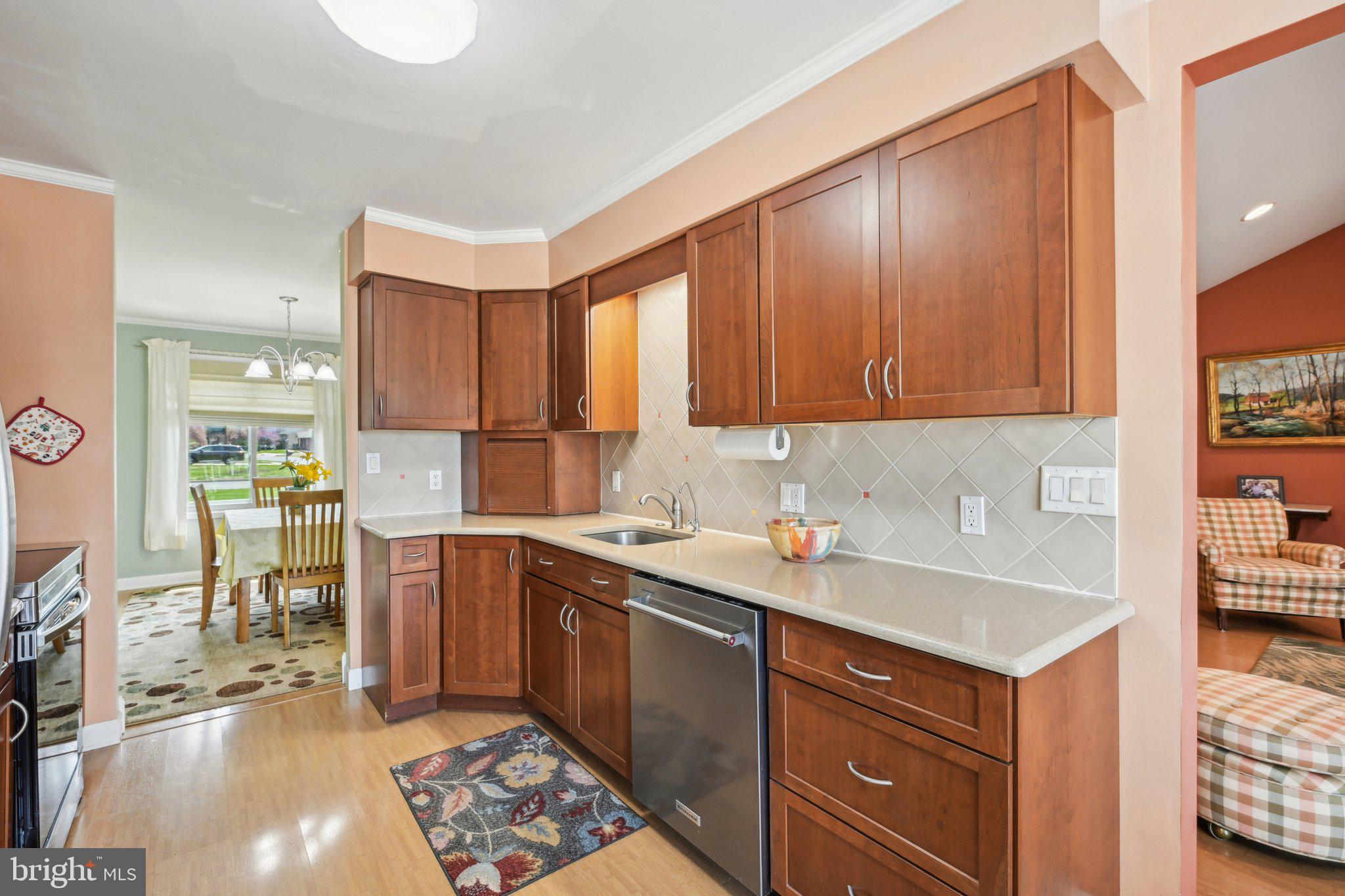 205 Lehigh Road South Glassboro, NJ 08028 - Photo 21 of 51 a kitchen with a sink and cabinets