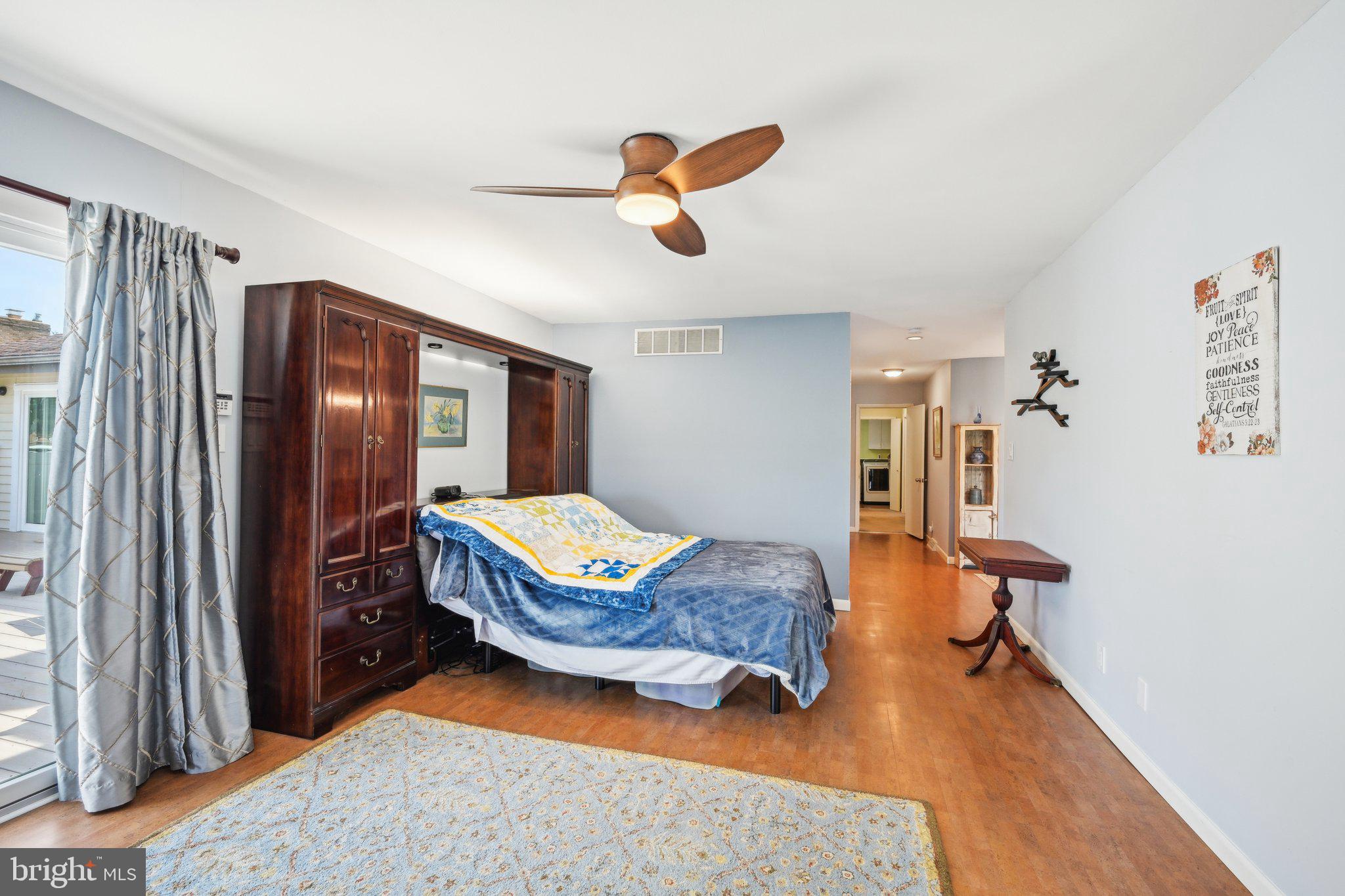 205 Lehigh Road South Glassboro, NJ 08028 - Photo 25 of 51 a living room with furniture and a wooden floor