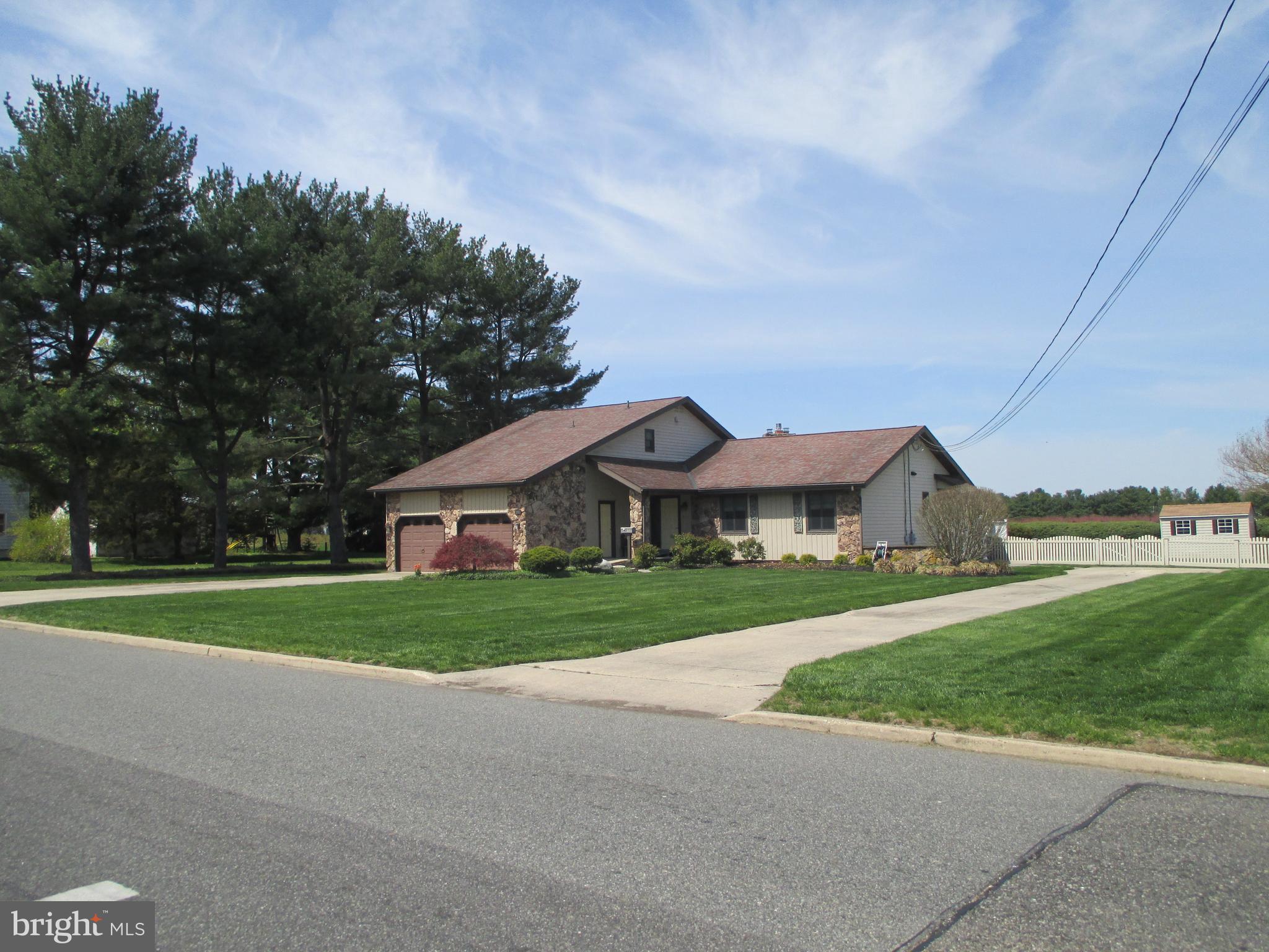 205 Lehigh Road South Glassboro, NJ 08028 - Photo 5 of 51 a front view of a house with a yard and garage