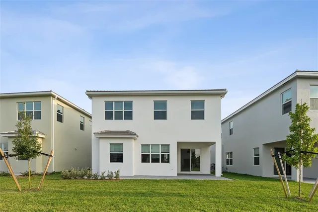 a view of a yard in front of a house