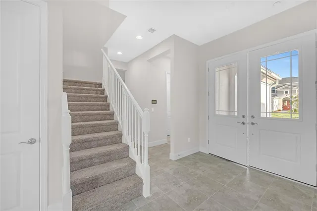a view of a hallway with staircase