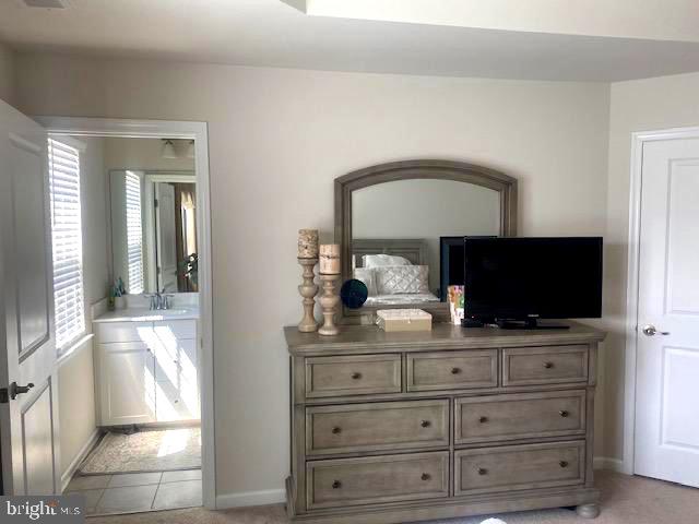 304 Pinnacle Place Sewell, NJ 08080 - Photo 22 of 41 Primary bedroom into bathroom