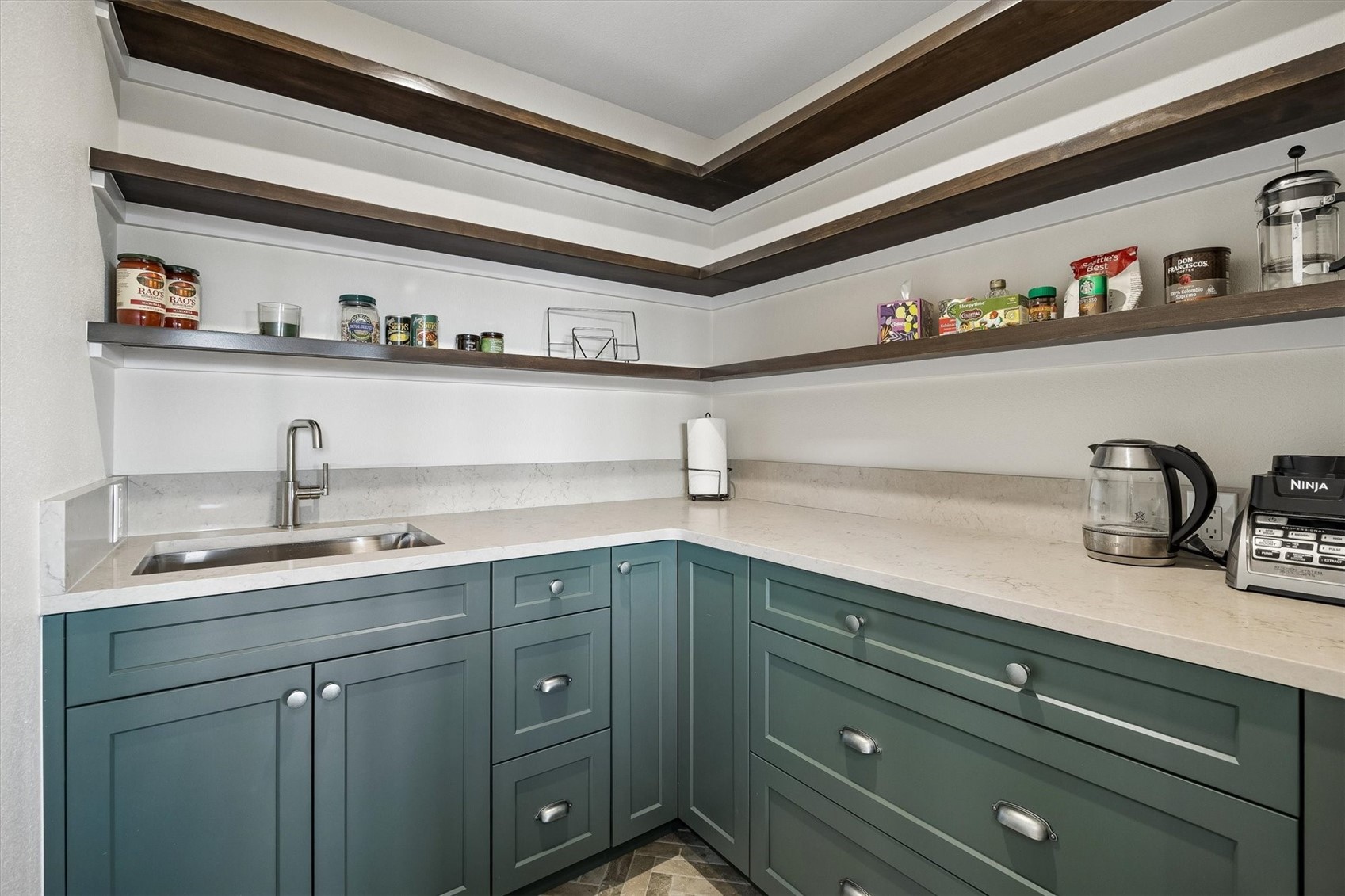51 West Ranch Trail Morrison, CO 80465 - Photo 9 of 50 a kitchen with a sink and cabinets