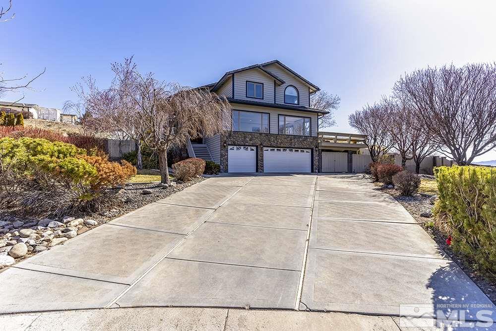 725 Arius Court Reno, NV 89512 - Photo 2 of 27 a view of a house with a yard