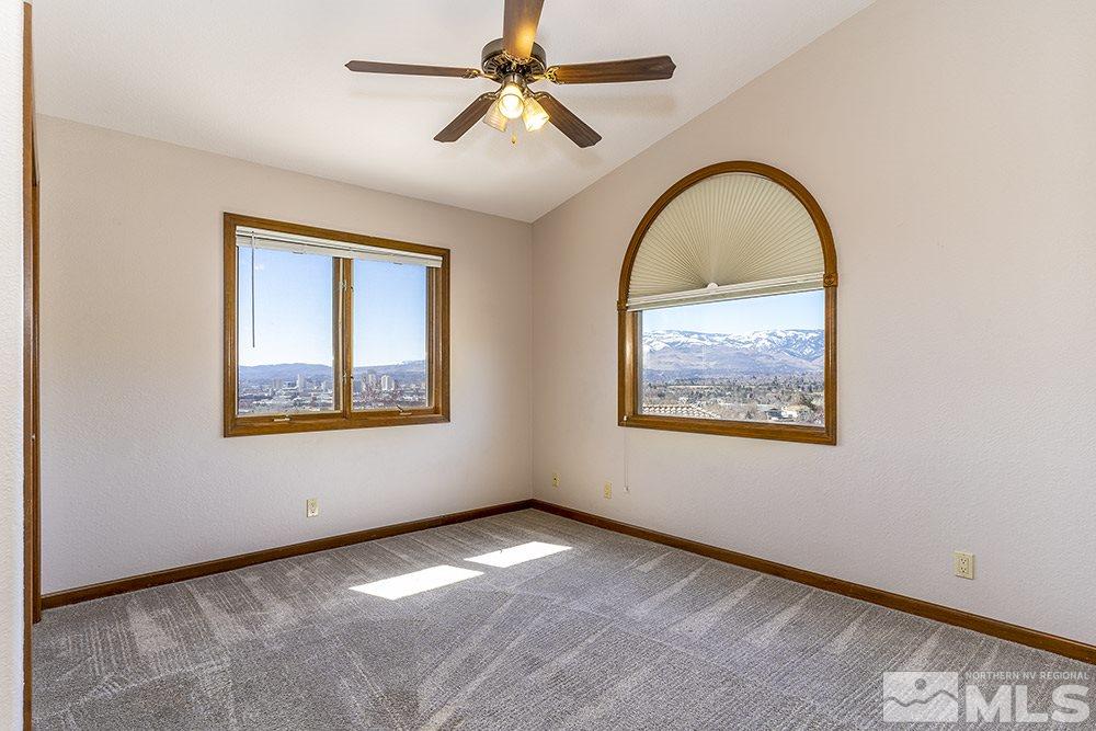 725 Arius Court Reno, NV 89512 - Photo 21 of 27 a view of an empty room with a window