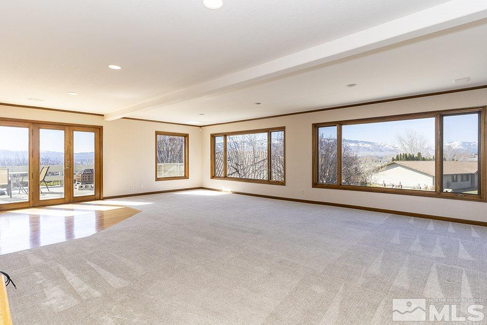 725 Arius Court Reno, NV 89512 - Photo 3 of 27 an empty room with windows and view