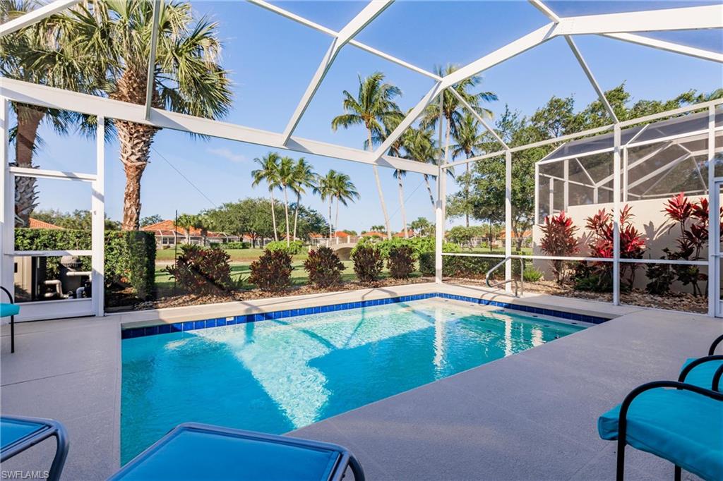 4704 Rio Poco Court Naples, FL 34109 - Photo 1 of 48 Privacy and relaxation! Extra long yard and bridge views from your pool!