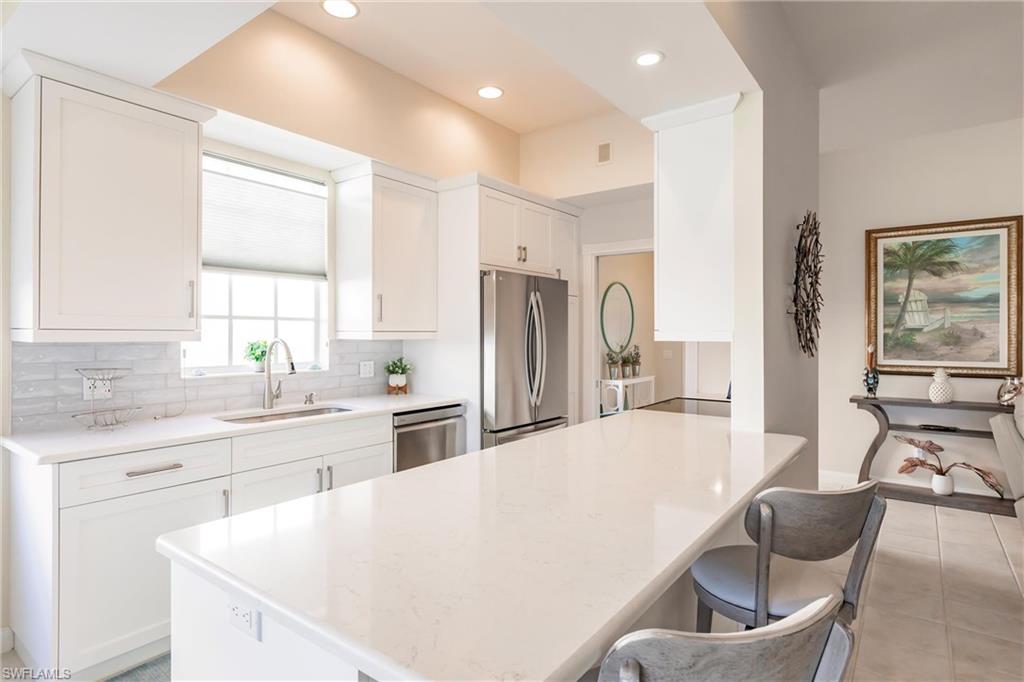 4704 Rio Poco Court Naples, FL 34109 - Photo 3 of 48 Remodeled kitchen!
