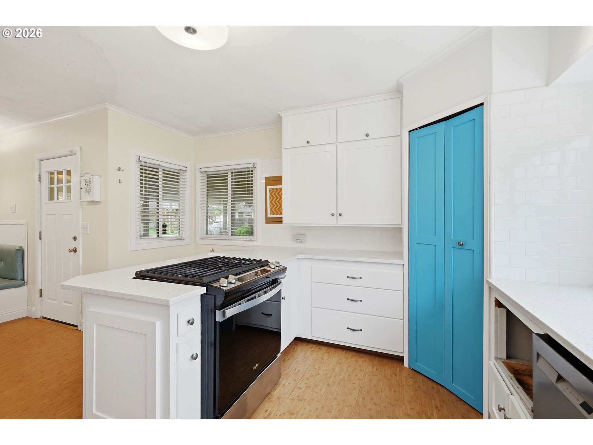 710 South 1st Street Cottage Grove, OR 97424 - Photo 13 of 46 a kitchen with granite countertop a stove and a sink