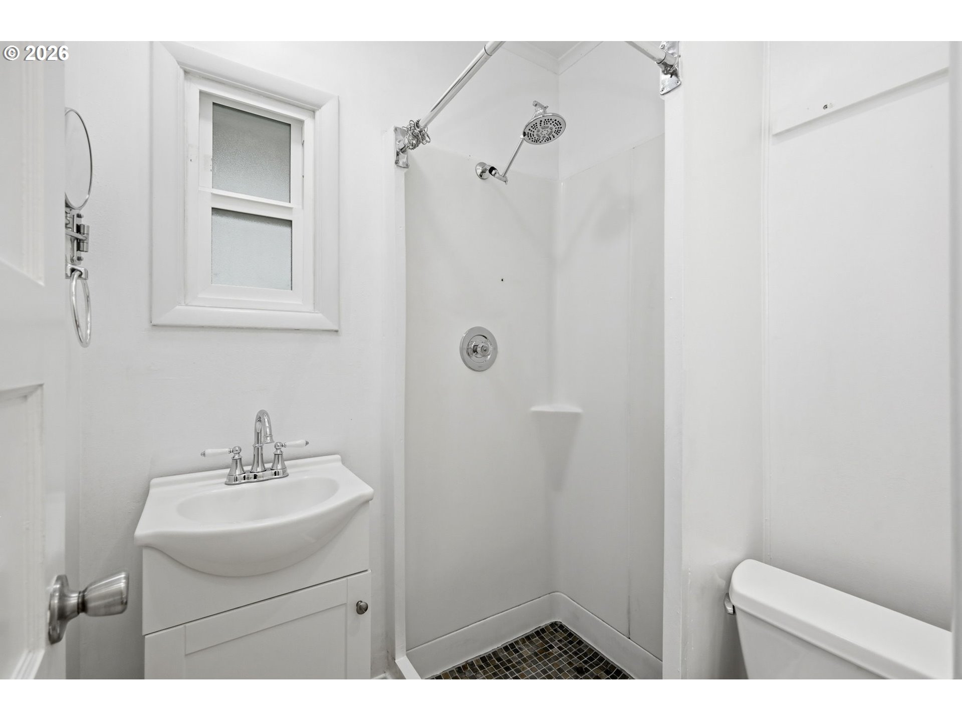 710 South 1st Street Cottage Grove, OR 97424 - Photo 21 of 46 a bathroom with a sink a toilet and shower