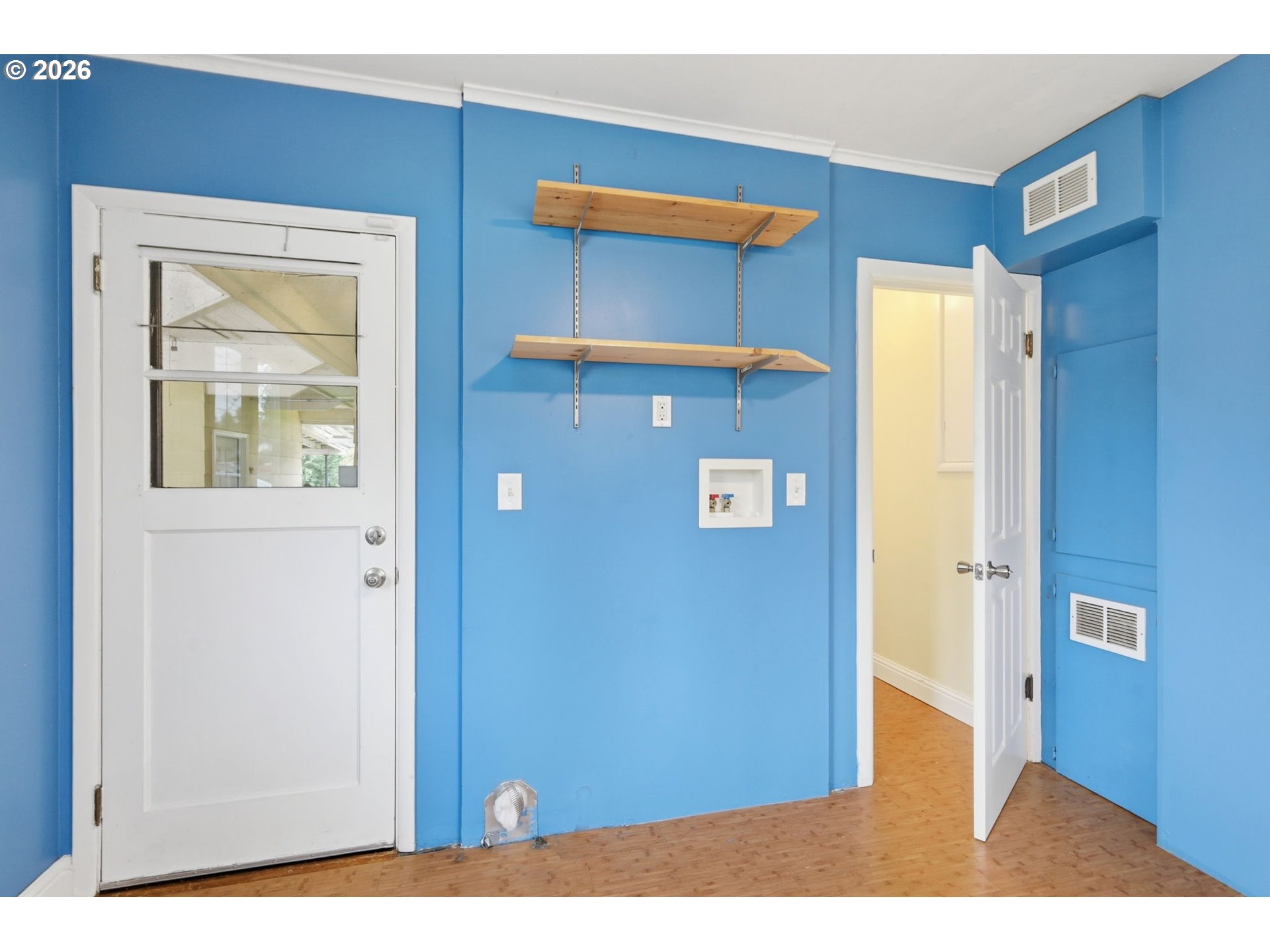 710 South 1st Street Cottage Grove, OR 97424 - Photo 25 of 46 a view of a livingroom with wooden floor