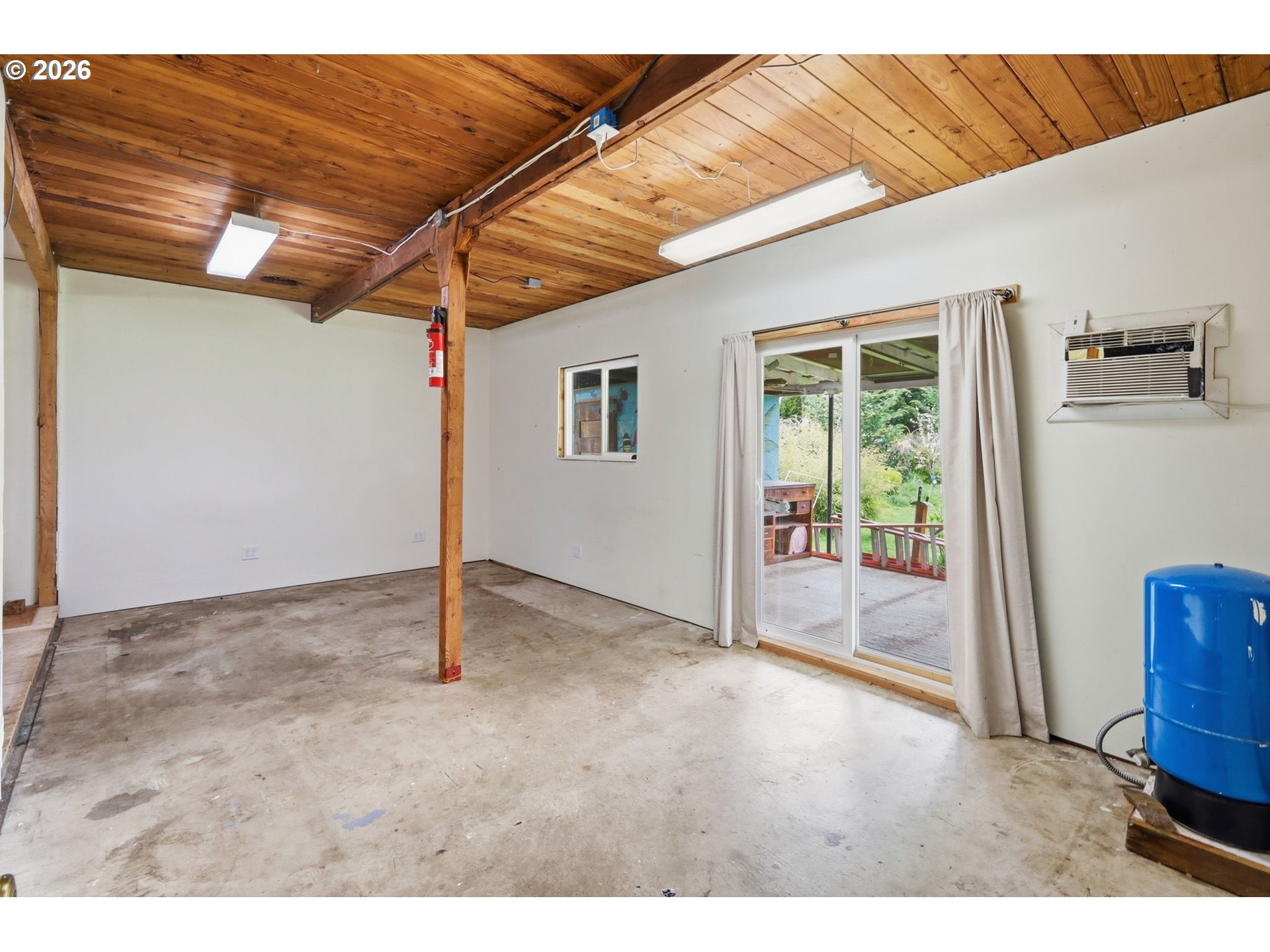 710 South 1st Street Cottage Grove, OR 97424 - Photo 26 of 46 a view of an empty room with a window