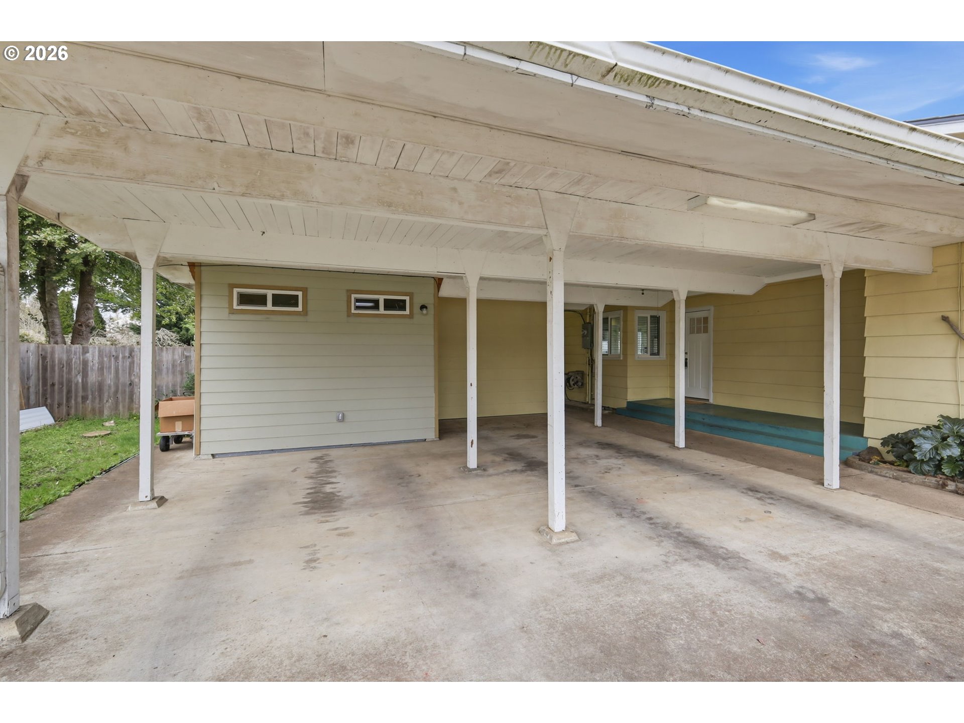 710 South 1st Street Cottage Grove, OR 97424 - Photo 29 of 46 a view of a house with a backyard and garage