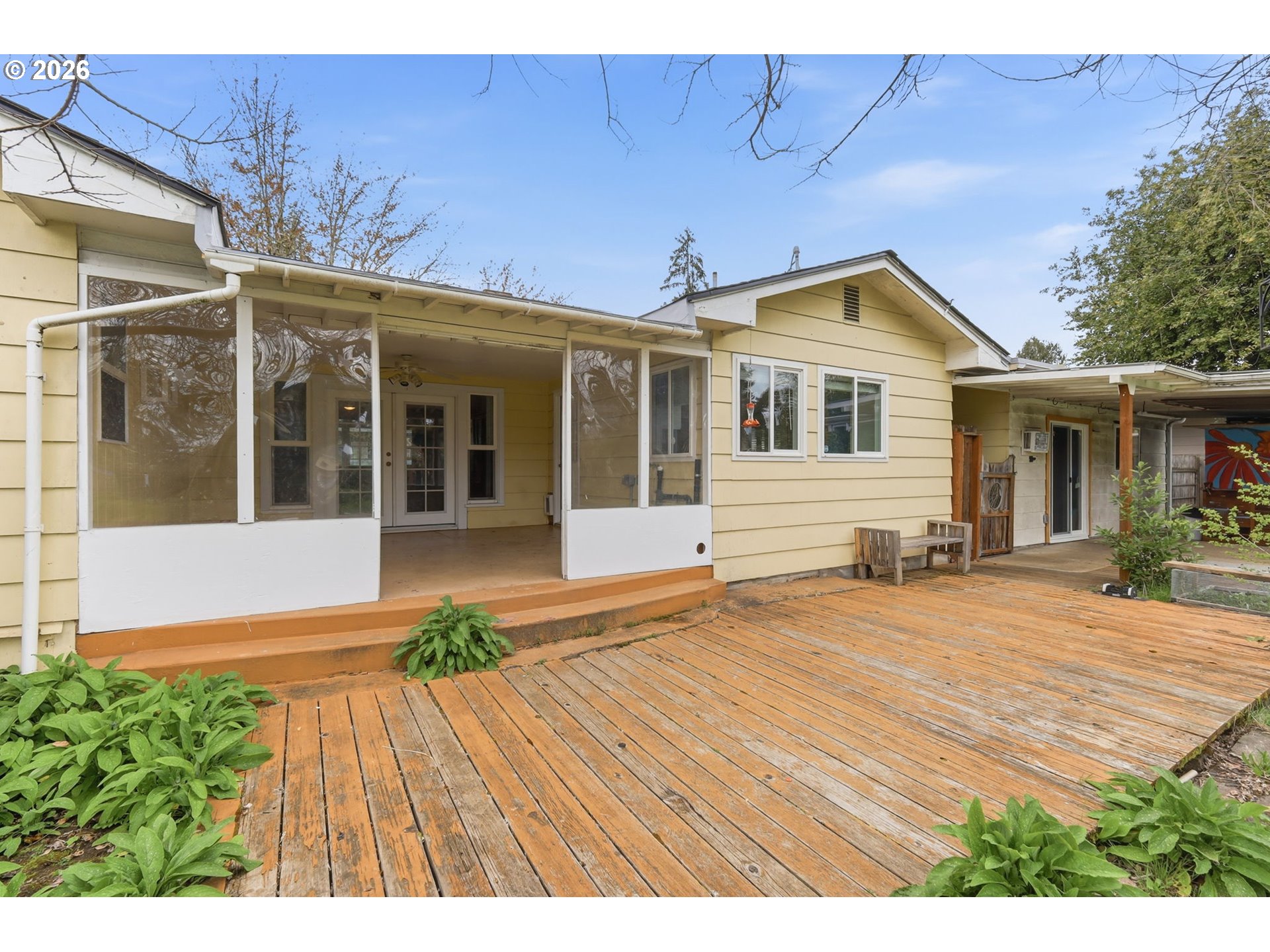 710 South 1st Street Cottage Grove, OR 97424 - Photo 30 of 46 a view of a house with a garden