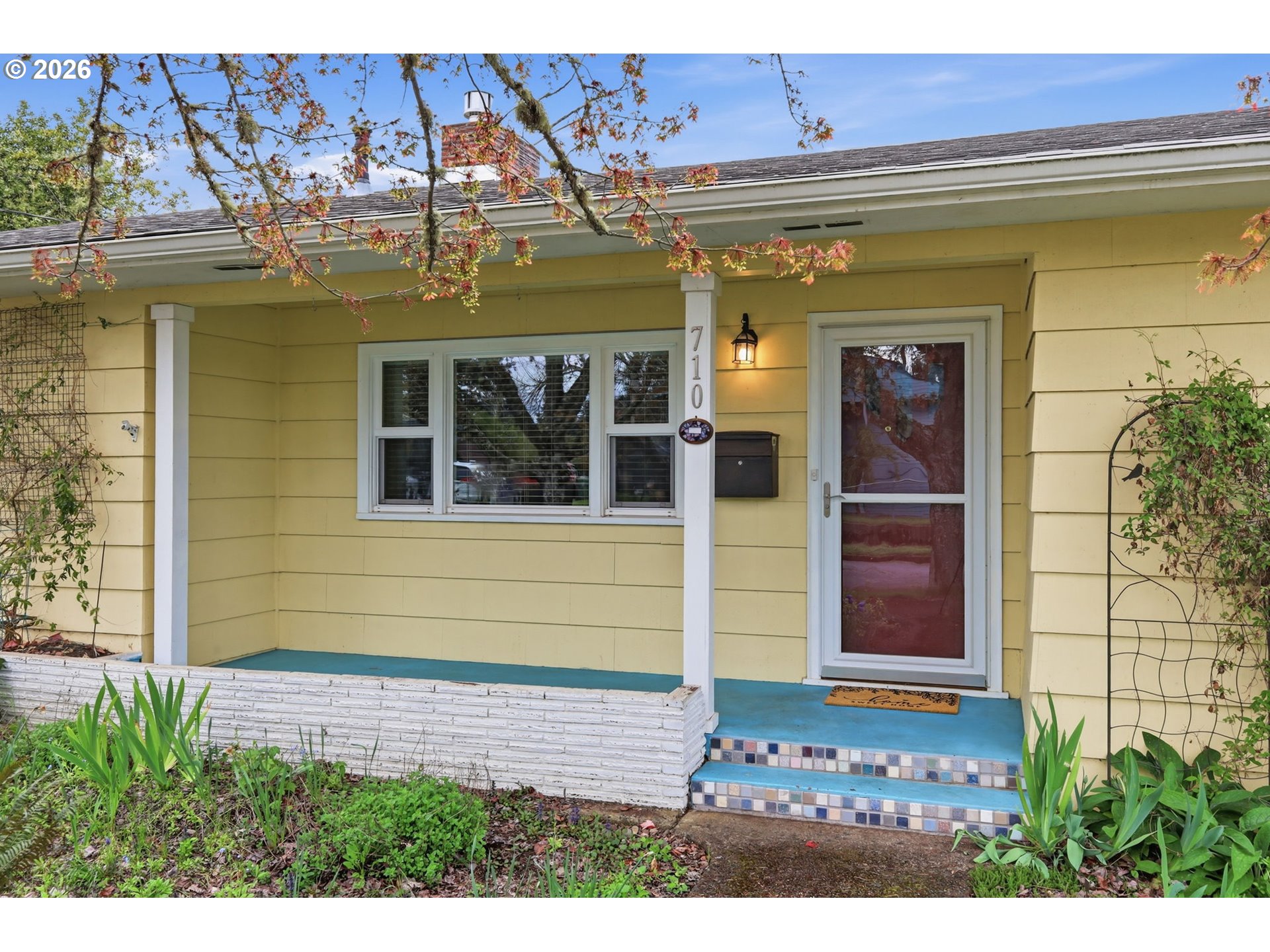 710 South 1st Street Cottage Grove, OR 97424 - Photo 3 of 46 a front view of a house with a garage