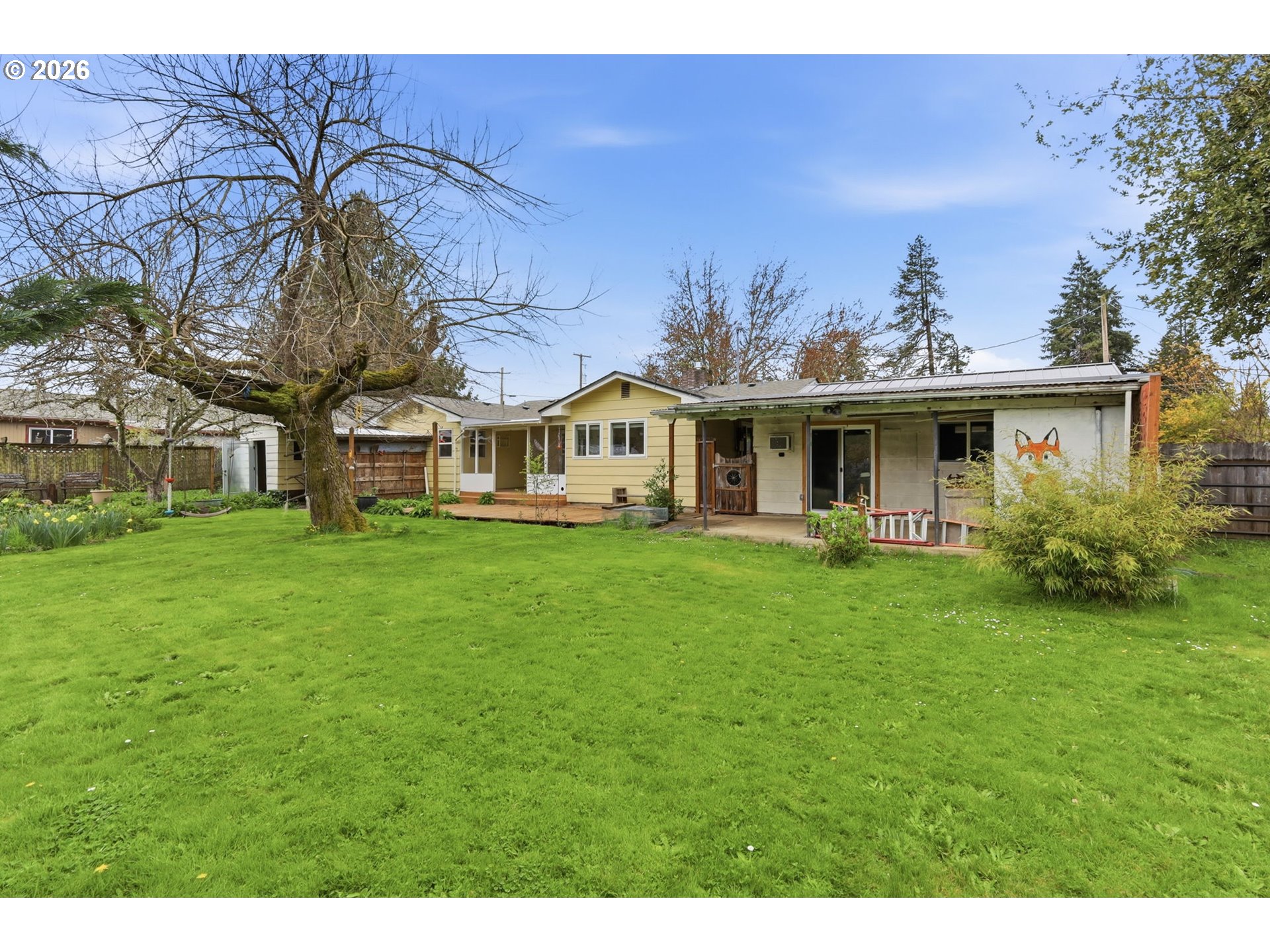 710 South 1st Street Cottage Grove, OR 97424 - Photo 34 of 46 a view of a house with a backyard