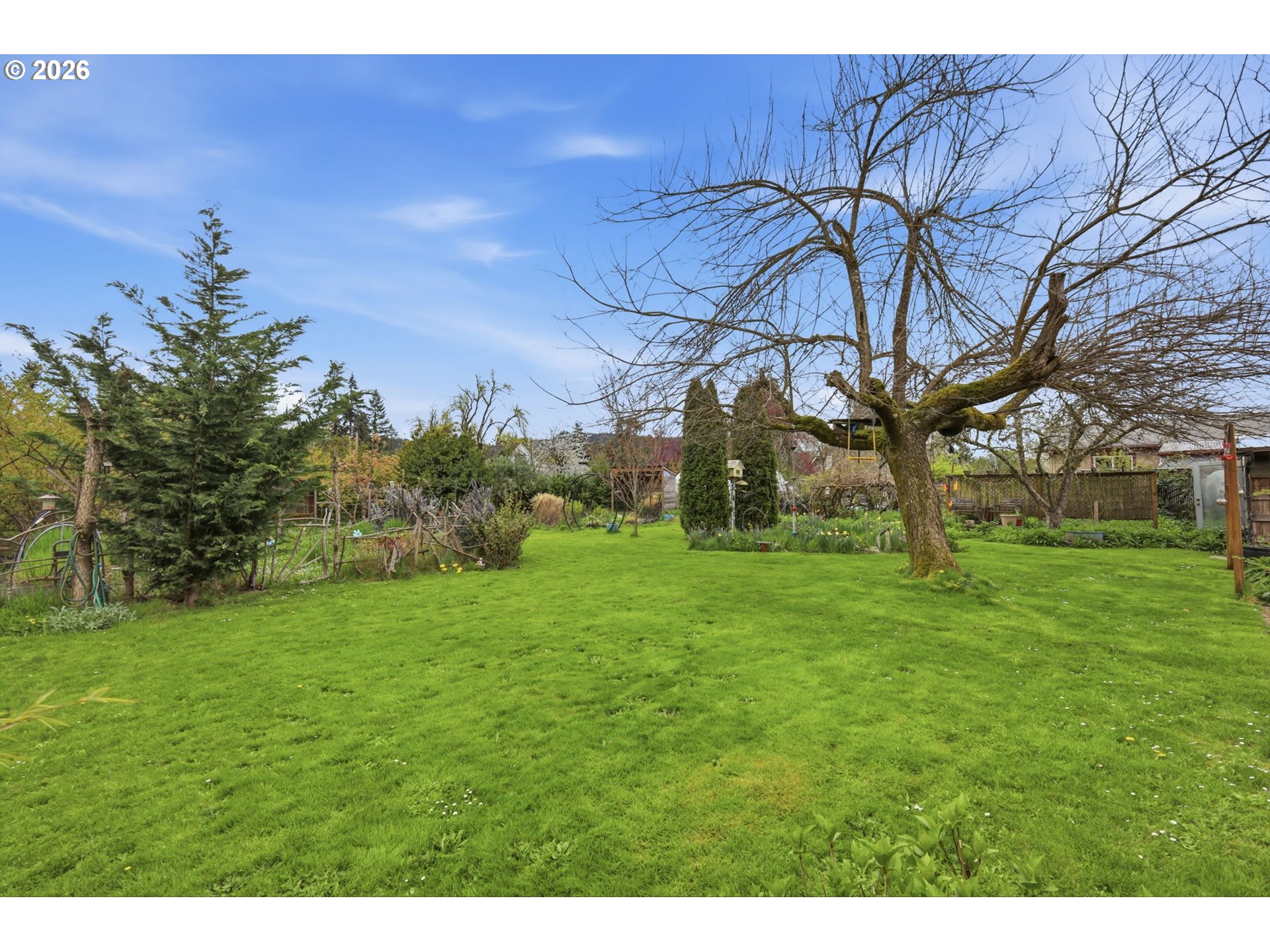 710 South 1st Street Cottage Grove, OR 97424 - Photo 37 of 46 a backyard of a house with lots of green space