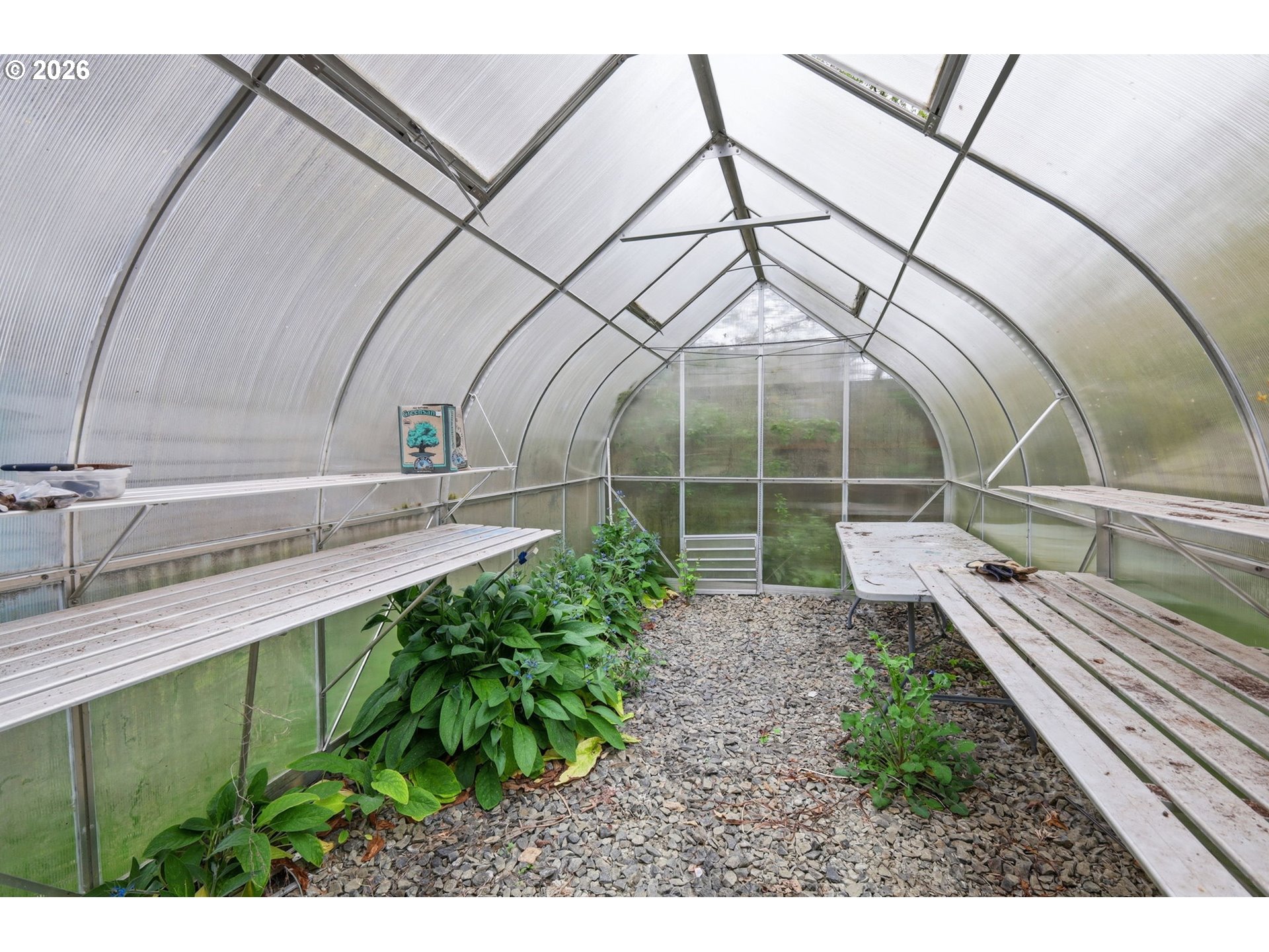 710 South 1st Street Cottage Grove, OR 97424 - Photo 40 of 46 a house view with a backyard space