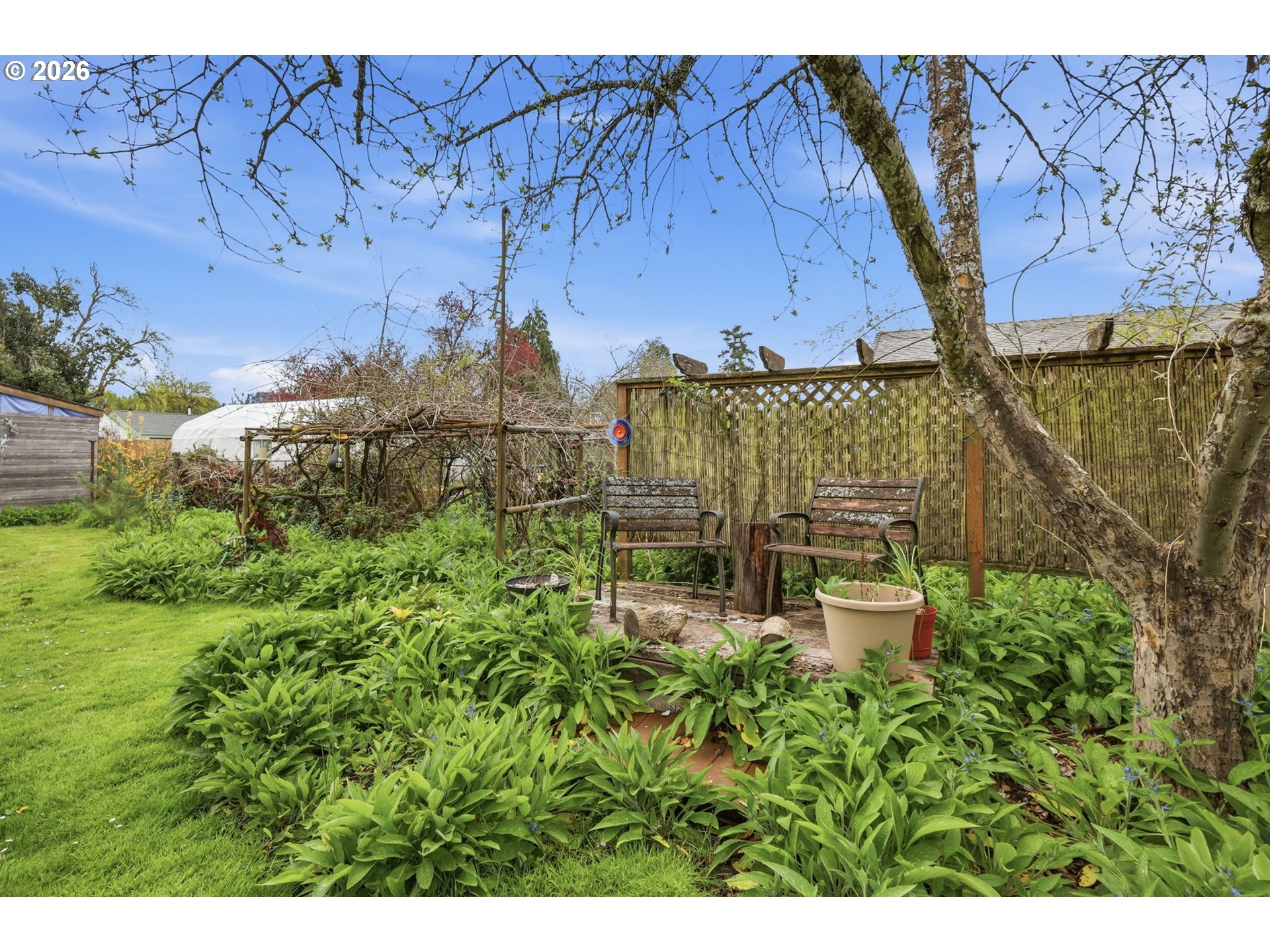 710 South 1st Street Cottage Grove, OR 97424 - Photo 42 of 46 a balcony with table and chairs