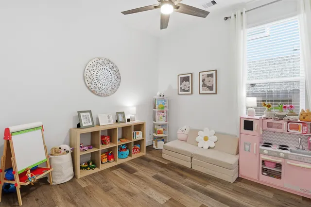 a kitchen with stainless steel appliances a refrigerator and cabinets
