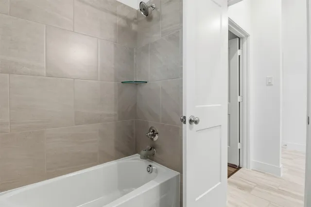 a bathroom with a sink toilet and a mirror