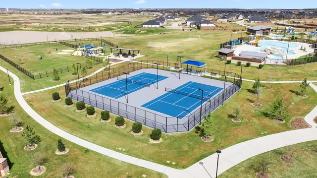a view of a swimming pool with an ocean view