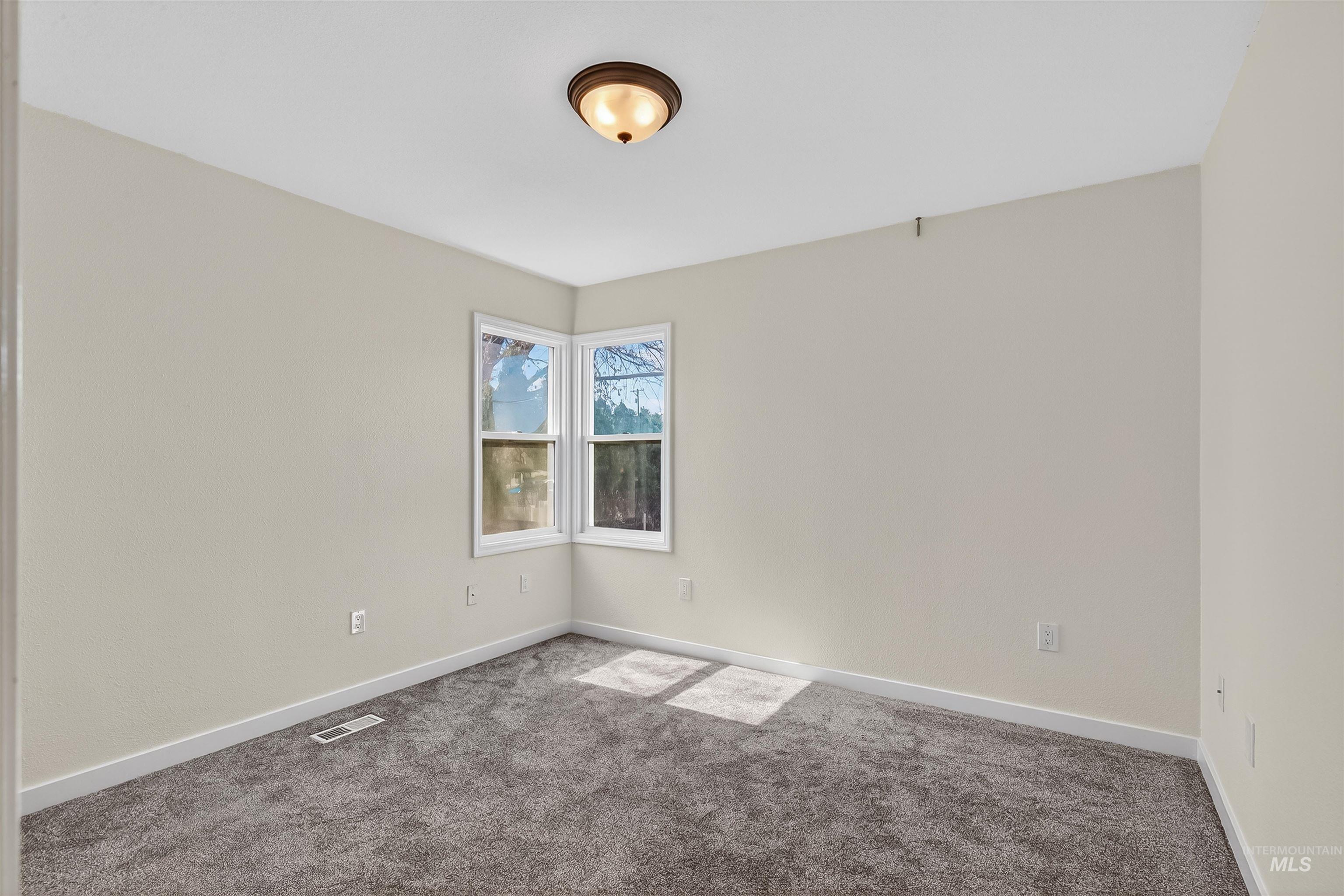1519 17th Street Lewiston, ID 83501 - Photo 17 of 39 Carpeted empty room featuring baseboards
