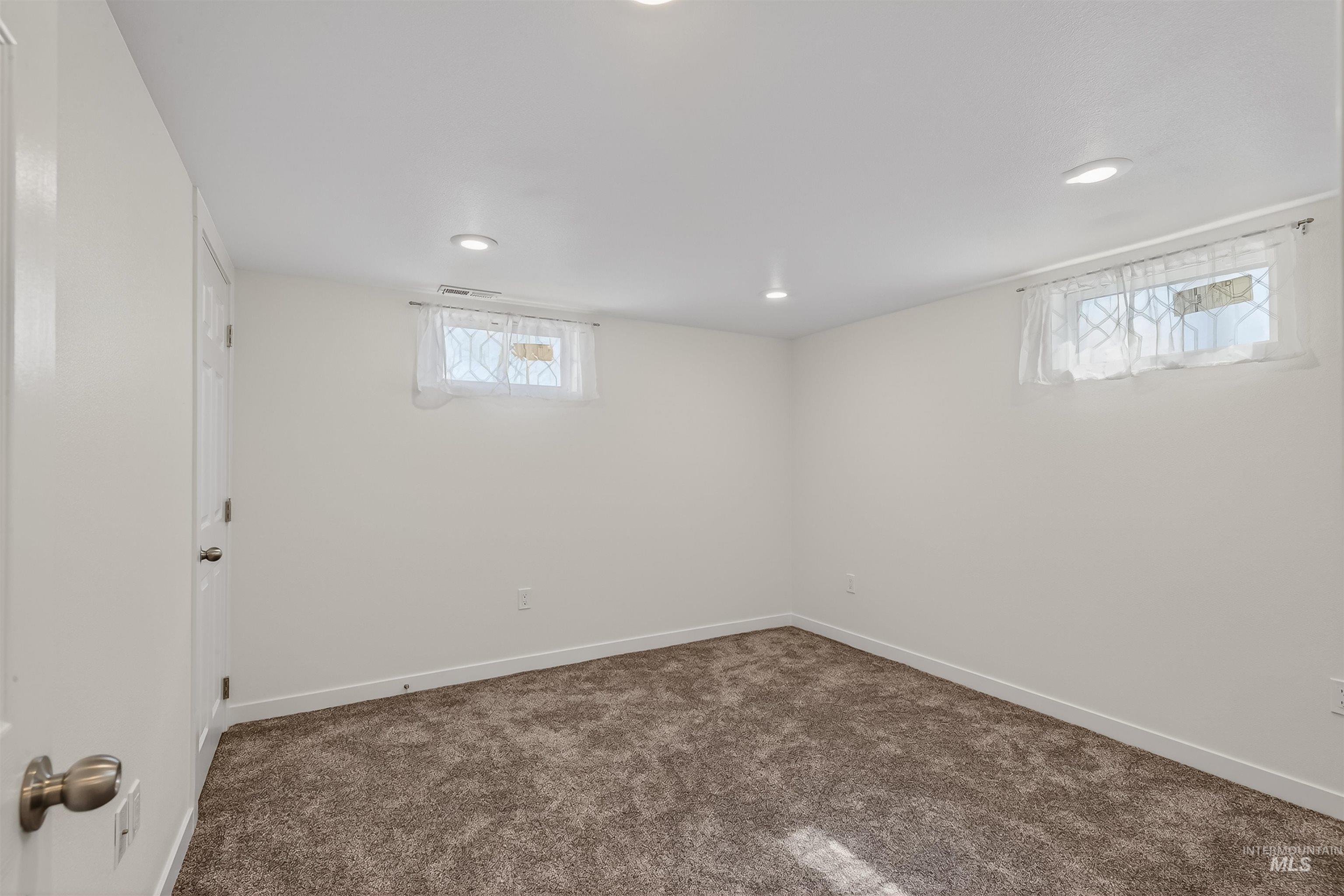 1519 17th Street Lewiston, ID 83501 - Photo 24 of 39 Below grade area featuring dark colored carpet and recessed lighting