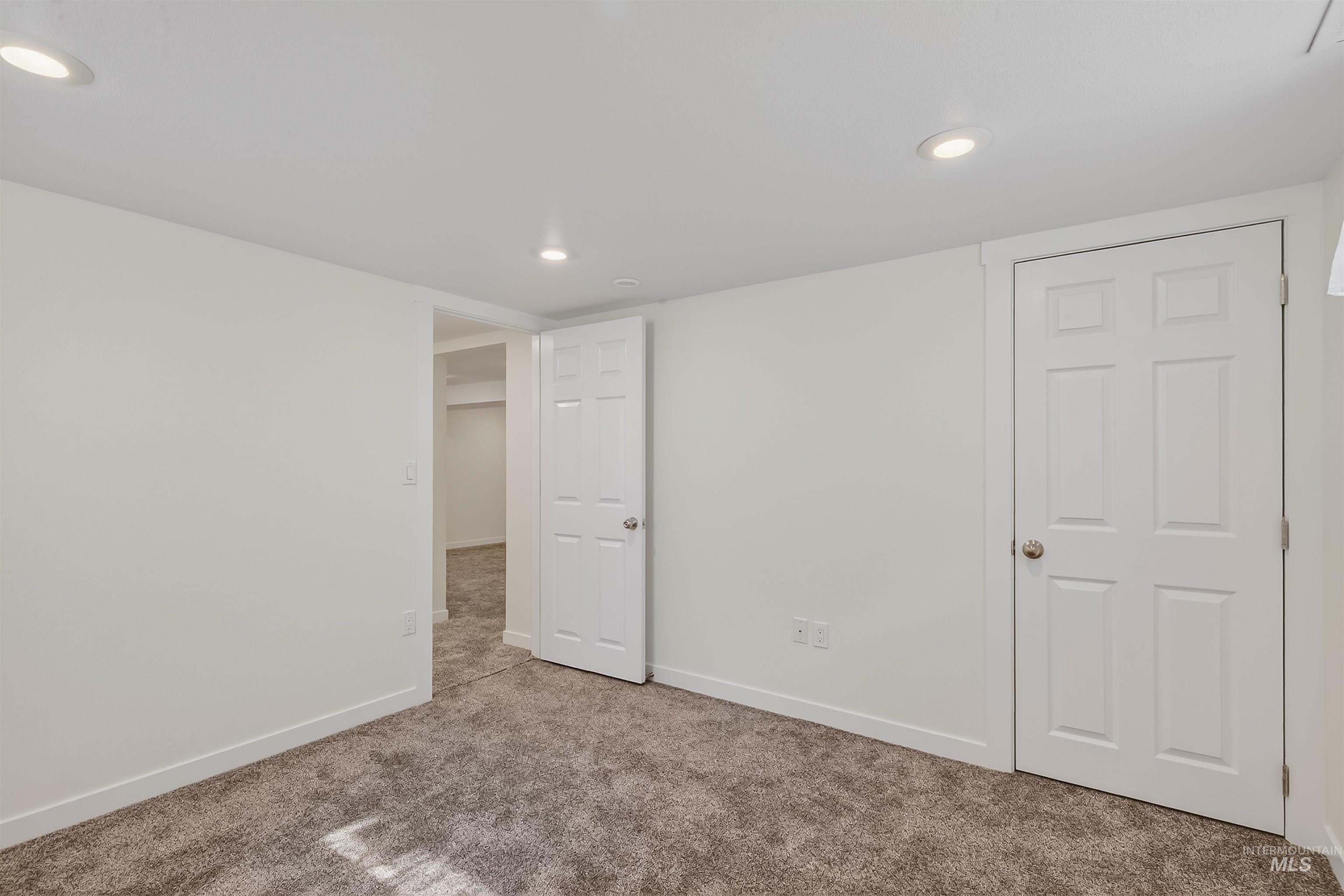 1519 17th Street Lewiston, ID 83501 - Photo 25 of 39 Unfurnished bedroom featuring recessed lighting and carpet floors