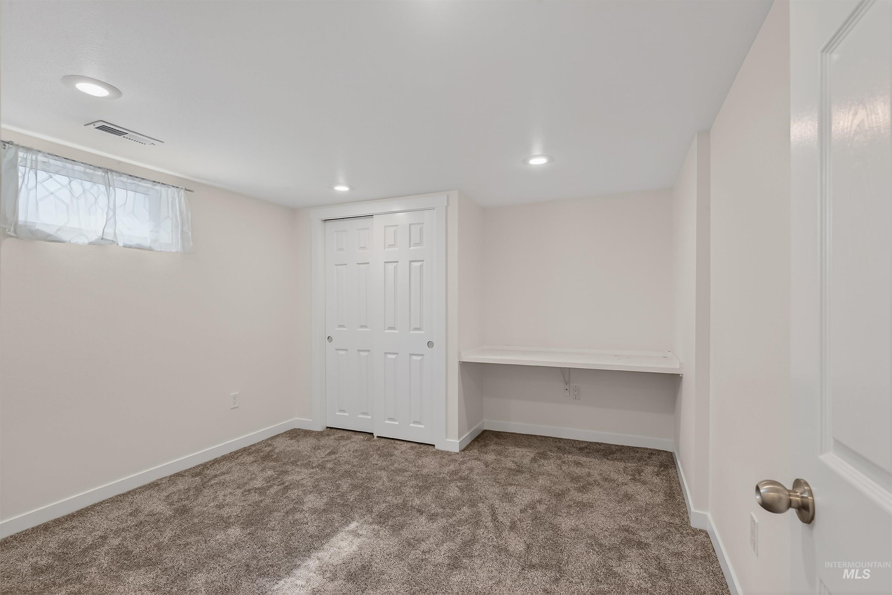 1519 17th Street Lewiston, ID 83501 - Photo 26 of 39 Basement with carpet and recessed lighting