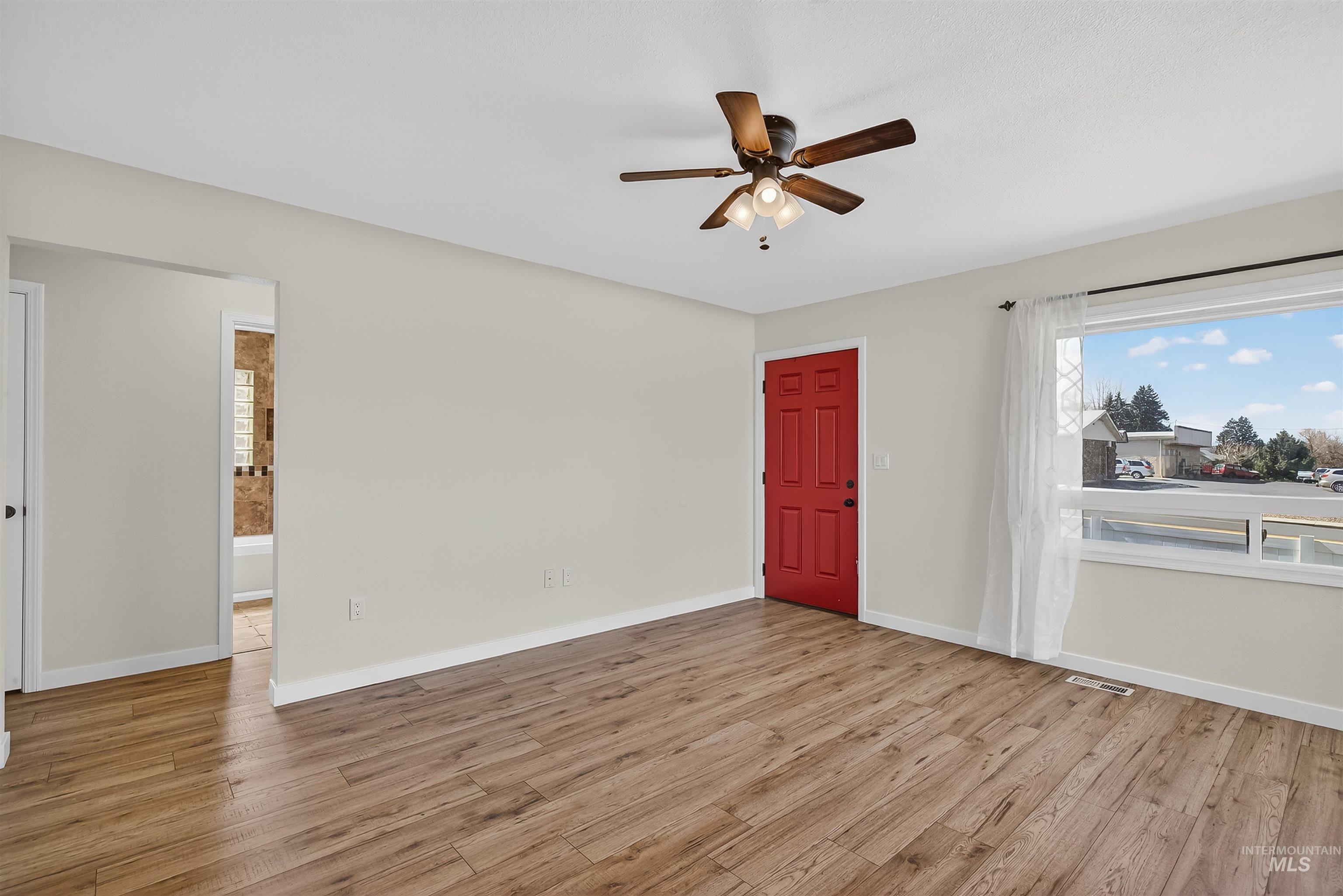 1519 17th Street Lewiston, ID 83501 - Photo 7 of 39 Entryway featuring ceiling fan and light wood-style floors