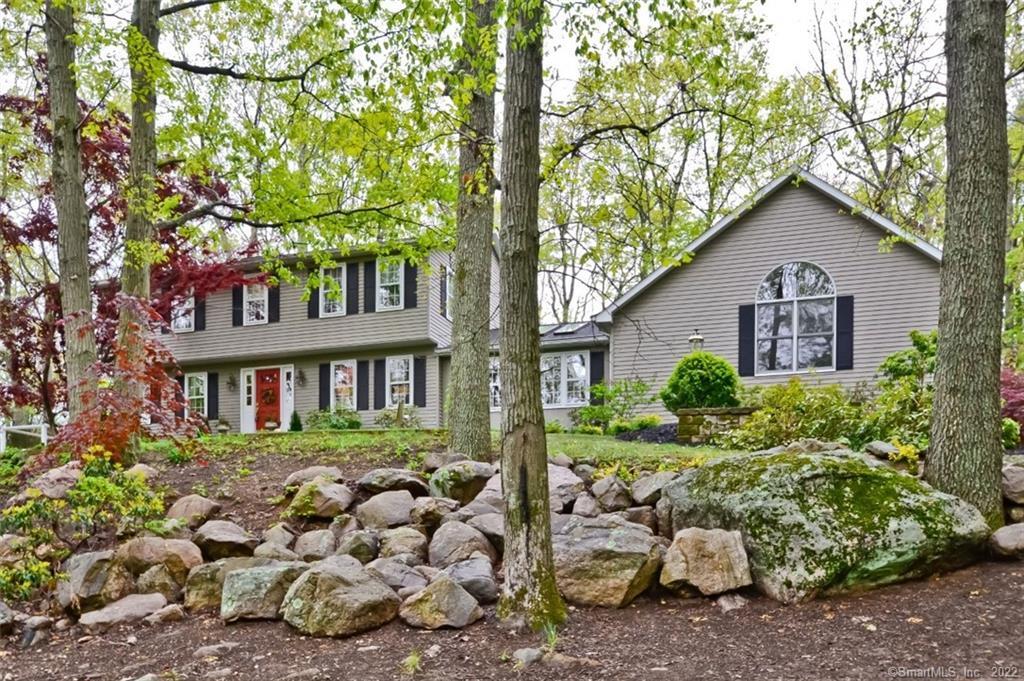 WELCOME HOME... this 4-bedroom center hall colonial also offers a 1-bedroom in-law/accessory apartment.